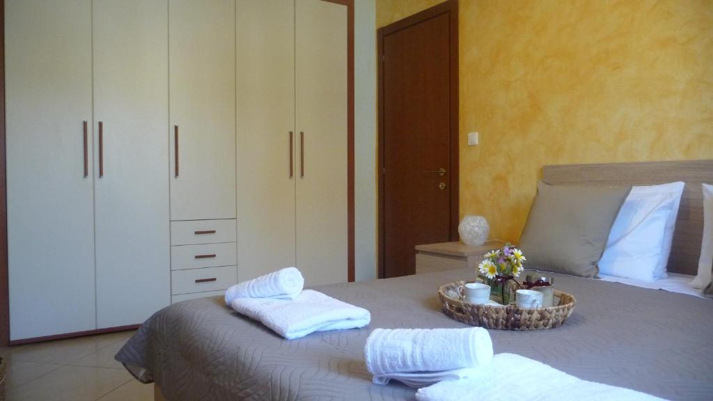 Postel nebo postele na pokoji v ubytování Comfy Apartment