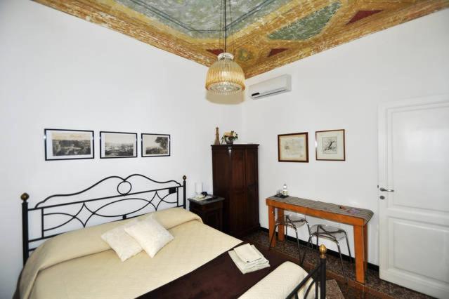 Postel nebo postele na pokoji v ubytování B&B I RIVI