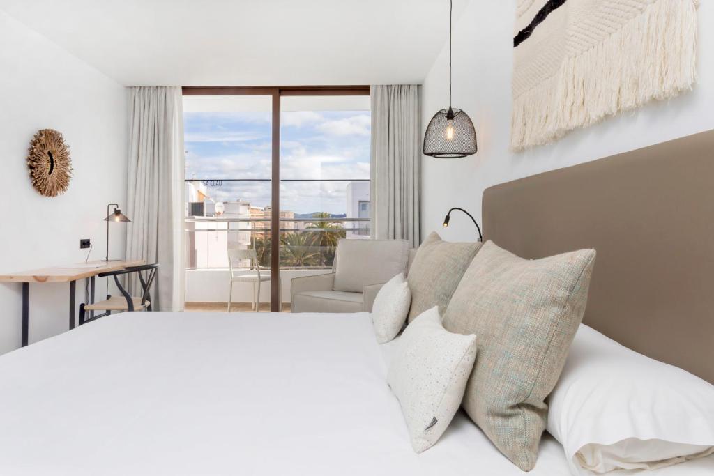Hotel Sa Clau by Mamboにあるベッド
