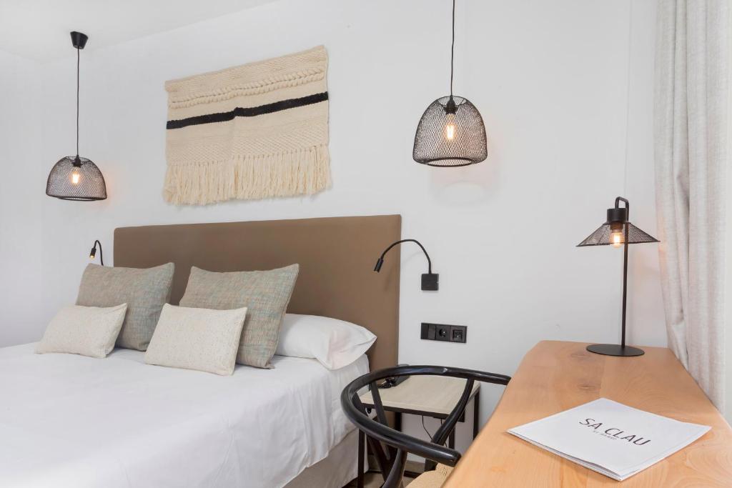 Hotel Sa Clau by Mamboにあるベッド