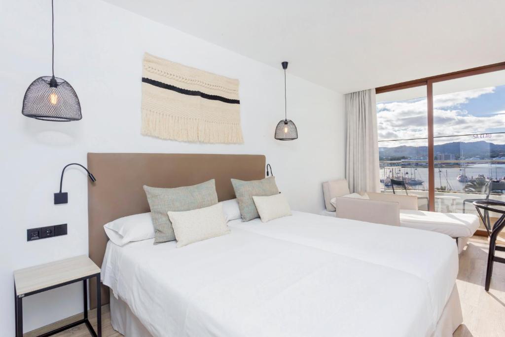 Hotel Sa Clau by Mamboにあるベッド