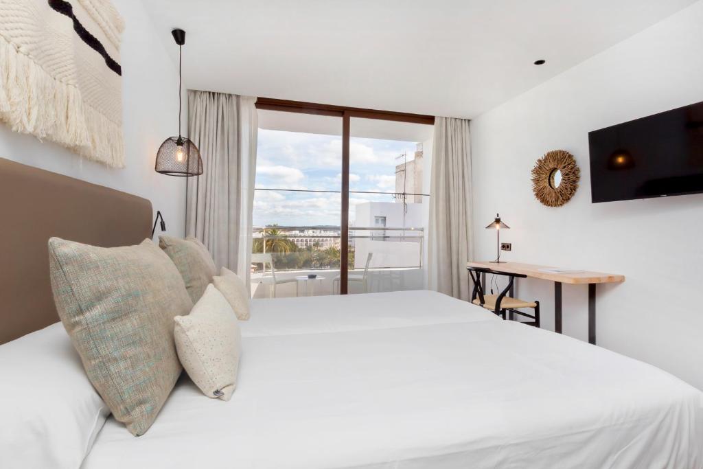 Hotel Sa Clau by Mamboにあるベッド