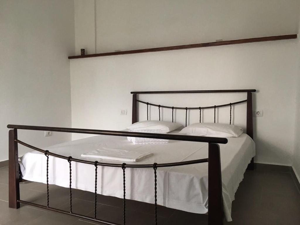 Postel nebo postele na pokoji v ubytování Valentina Rooms