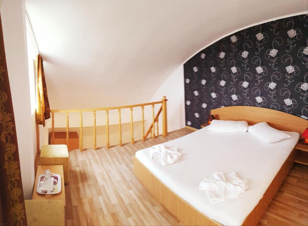 Postel nebo postele na pokoji v ubytování Casa CIC