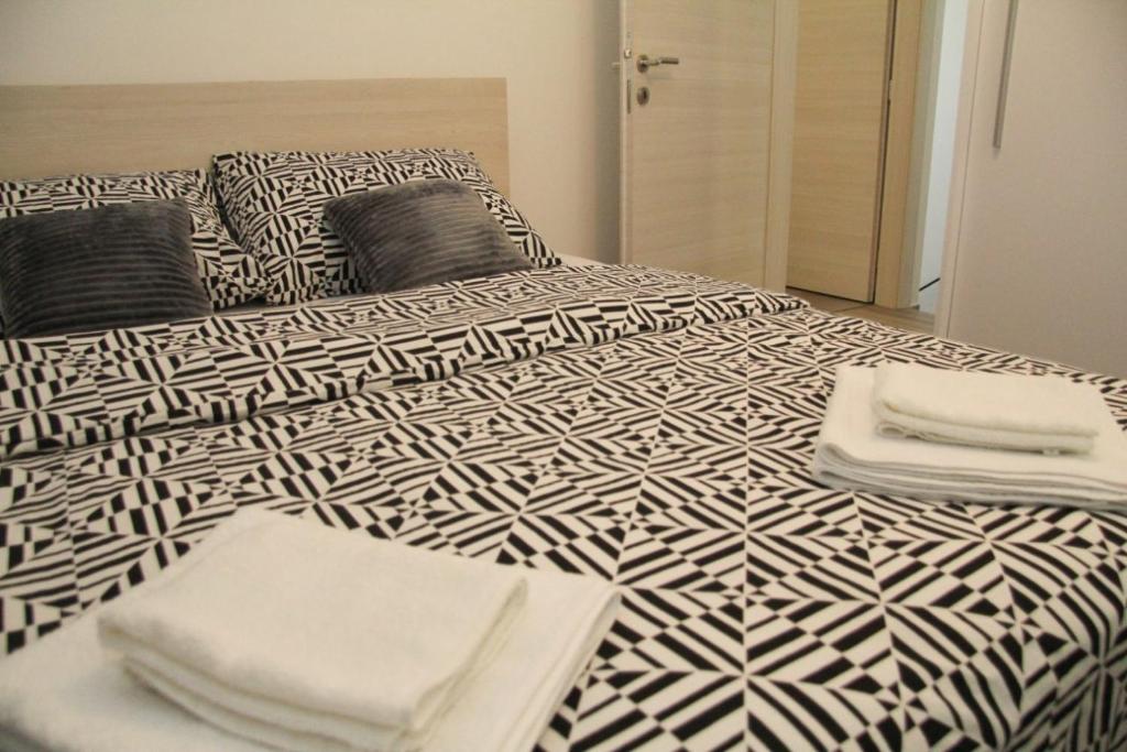 Posteľ alebo postele v izbe v ubytovaní Apartman Rina,Biograd na moru