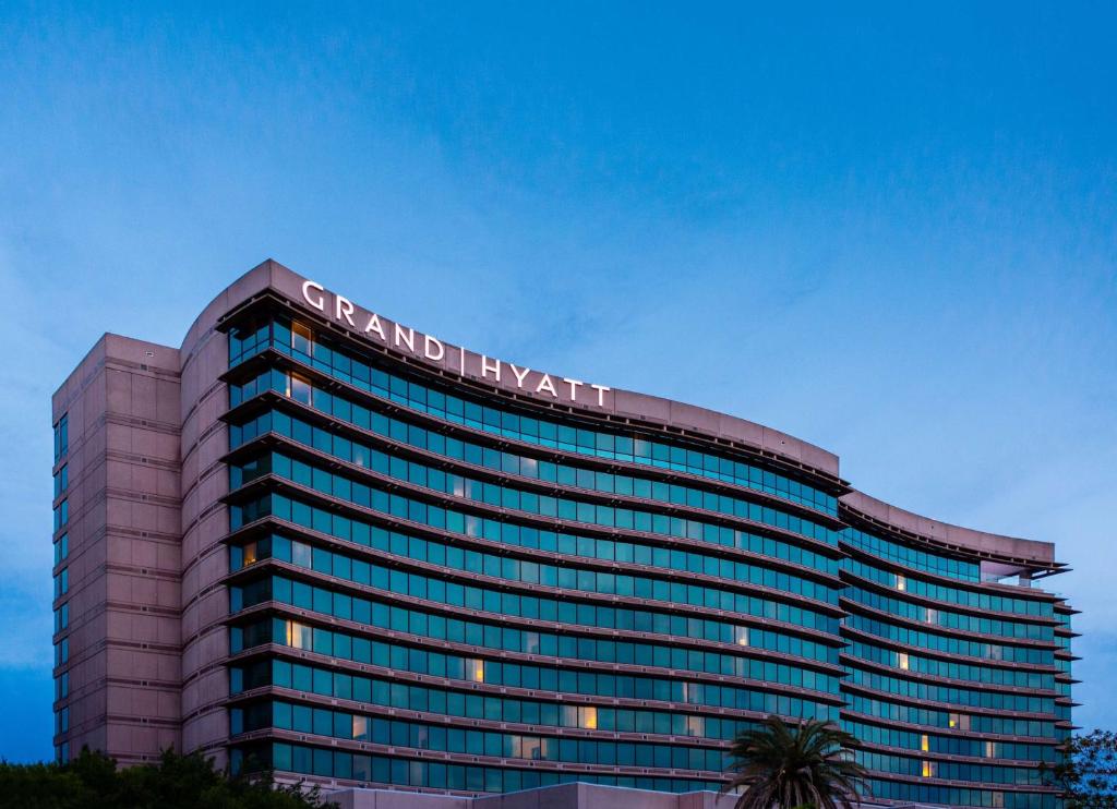 
a large building with a clock on the top of it at Grand Hyatt Tampa Bay in Tampa
