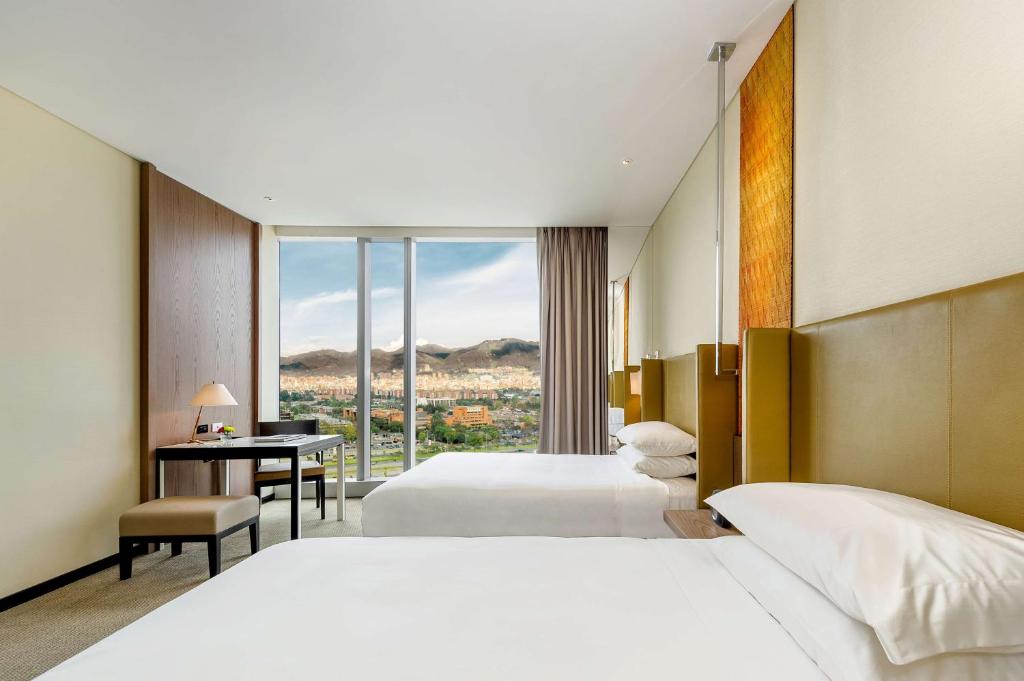 Postel nebo postele na pokoji v ubytování Grand Hyatt Bogota