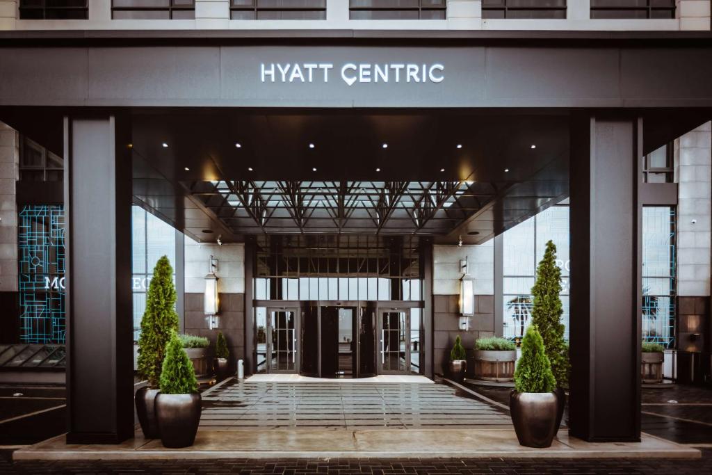 a lobby of a building with a sign that reads knight centre at Hyatt Centric Montevideo in Montevideo