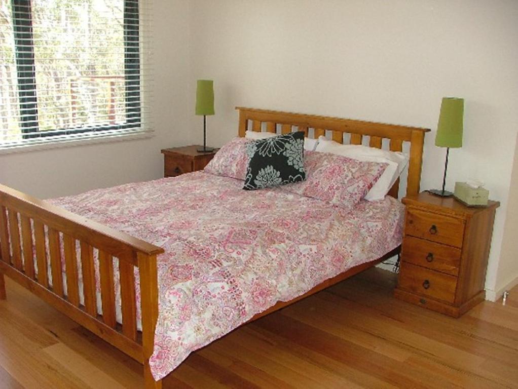 En eller flere senge i et værelse på Braidwood Escape