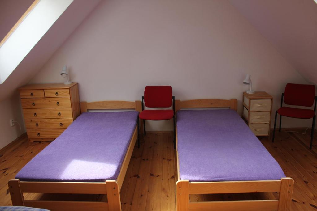 Łóżko lub łóżka w pokoju w obiekcie Chalupa Bechyně
