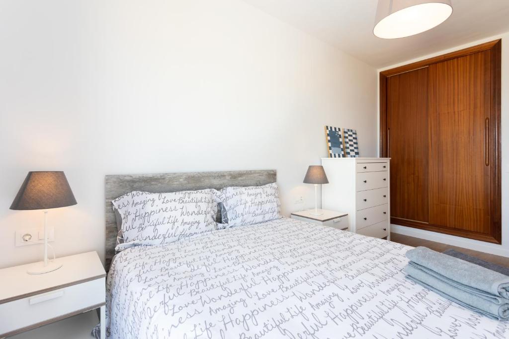 Posteľ alebo postele v izbe v ubytovaní Home2Book Amazing Sea View El Médano Pool & Wifi