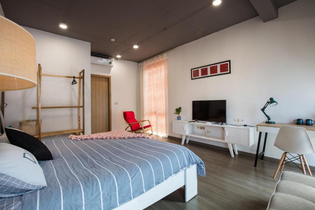 Postel nebo postele na pokoji v ubytování SaziHome Le Thanh Tong Hanoi