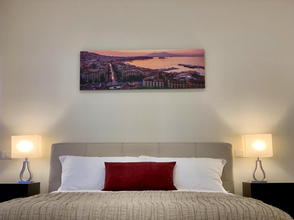 Postel nebo postele na pokoji v ubytování SILIA HOUSE Napoli Centro