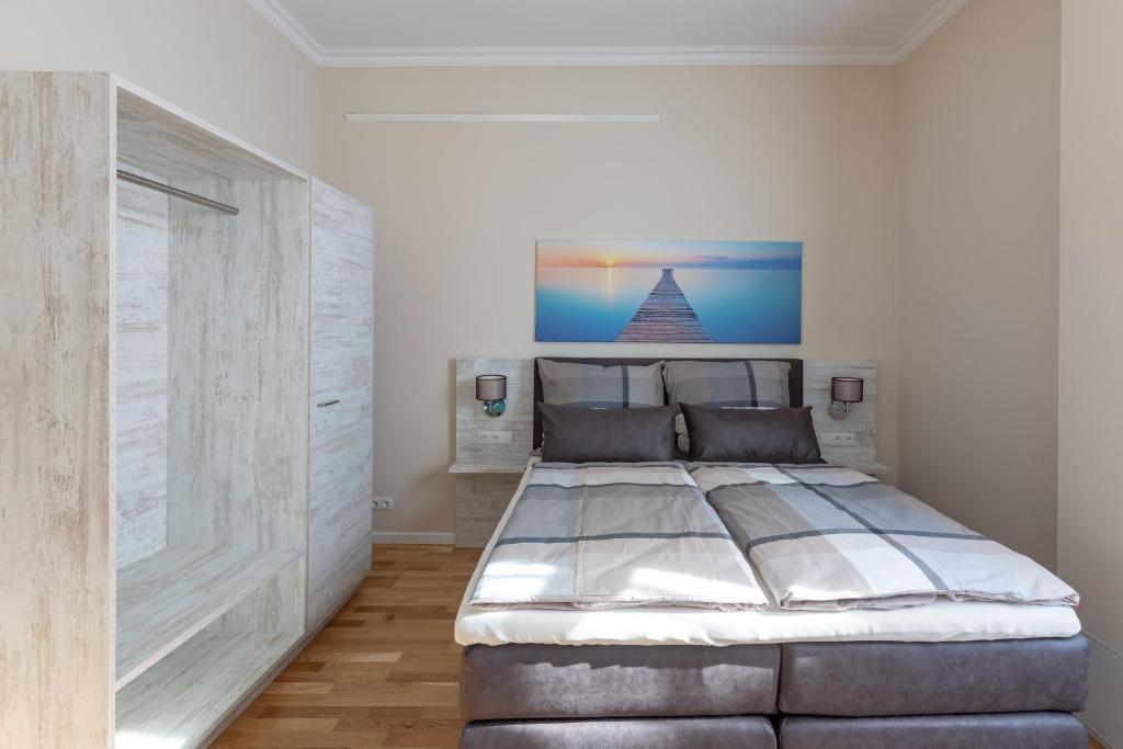 Postel nebo postele na pokoji v ubytování Nordic Wave Apartments