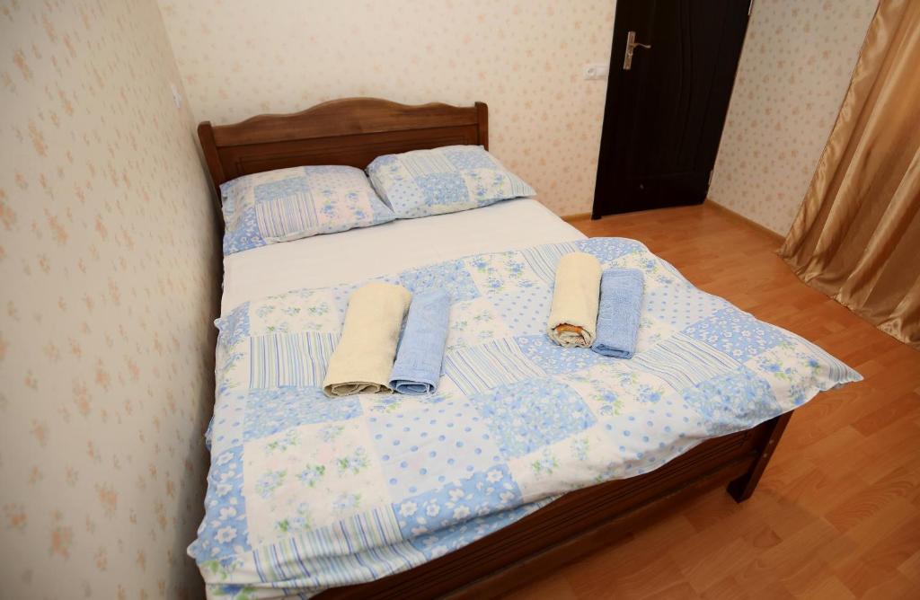 Postel nebo postele na pokoji v ubytování Guest House Zatika