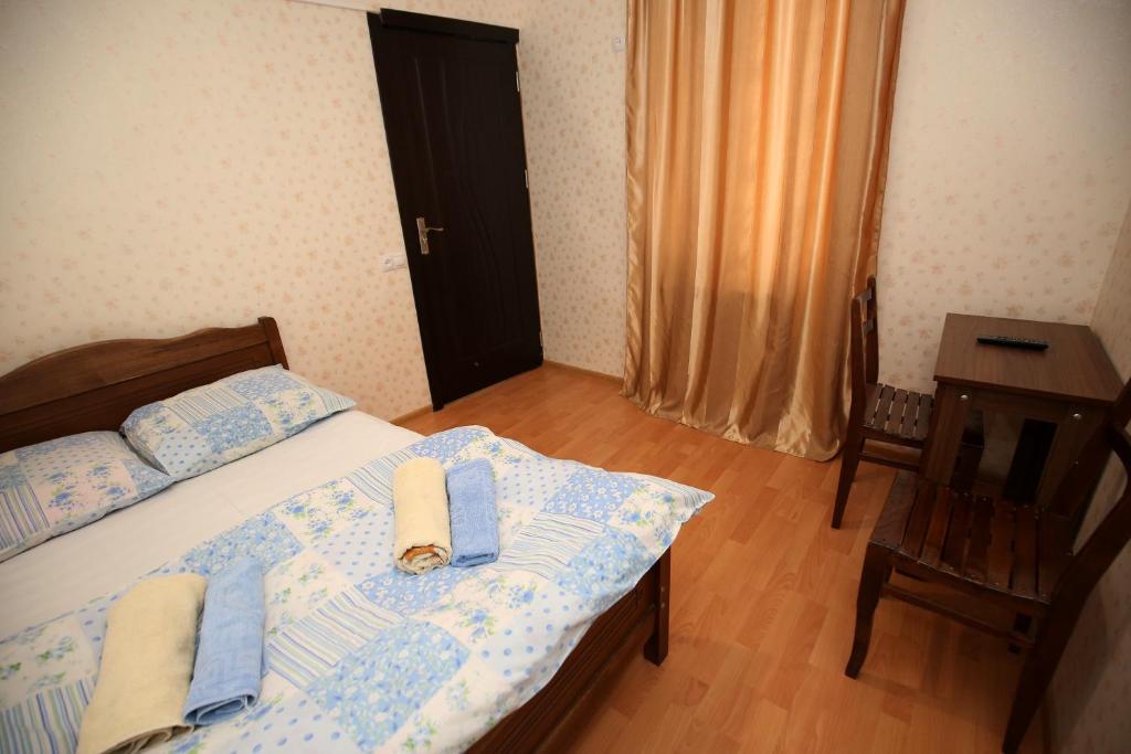 Postel nebo postele na pokoji v ubytování Guest House Zatika
