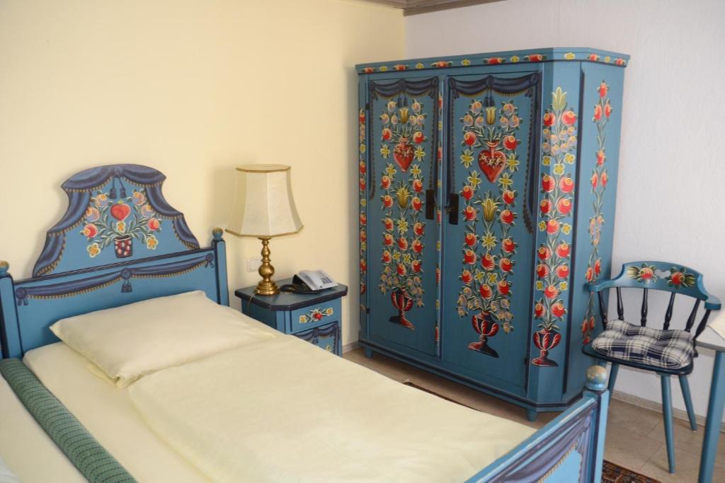 Postel nebo postele na pokoji v ubytování Hotel Das Schlössl