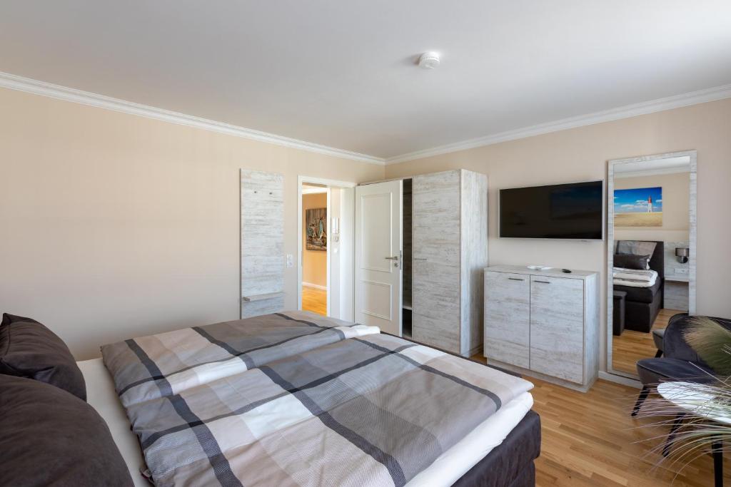 Postel nebo postele na pokoji v ubytování Nordic Wave Apartments