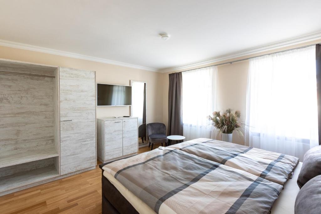 Postel nebo postele na pokoji v ubytování Nordic Wave Apartments