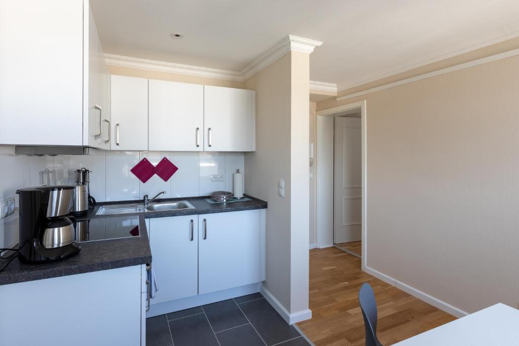 Kuchyň nebo kuchyňský kout v ubytování Nordic Wave Apartments