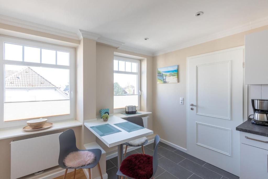 Kuchyň nebo kuchyňský kout v ubytování Nordic Wave Apartments