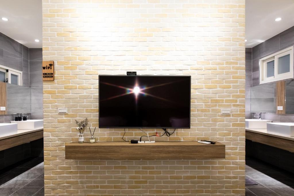 TV a/nebo společenská místnost v ubytování Mi Jing Shih Guang