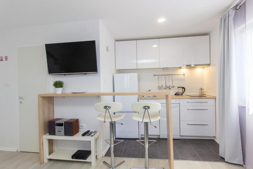 Kuchyň nebo kuchyňský kout v ubytování Apartment Betina Inn