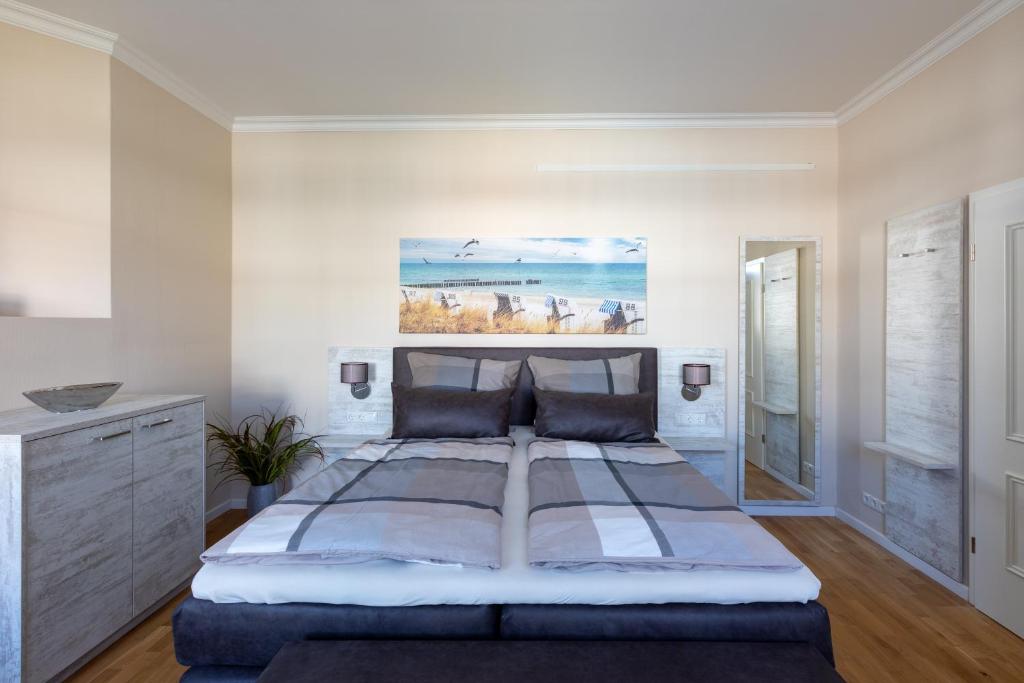 Postel nebo postele na pokoji v ubytování Nordic Wave Apartments