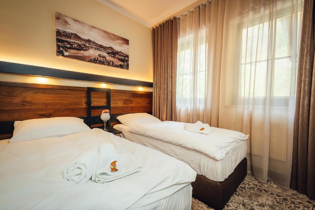 Postel nebo postele na pokoji v ubytování Guest House EJGA