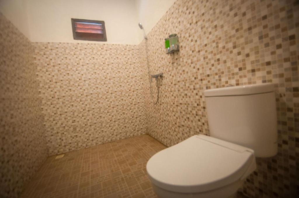 Koupelna v ubytování Japa Bungalow