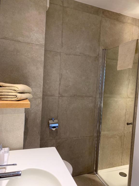 Koupelna v ubytování Hotel Arcato