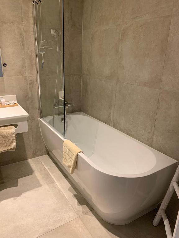 Koupelna v ubytování Hotel Arcato