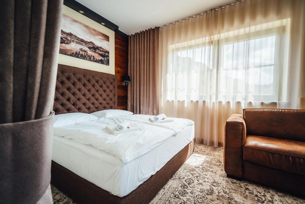 Postel nebo postele na pokoji v ubytování Guest House EJGA
