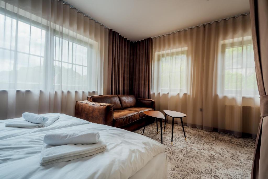Postel nebo postele na pokoji v ubytování Guest House EJGA