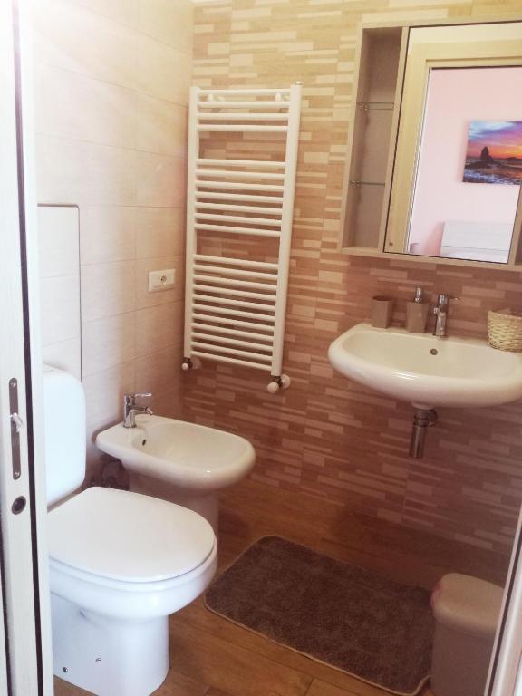 Koupelna v ubytování B&B la spiaggetta di Stazzo