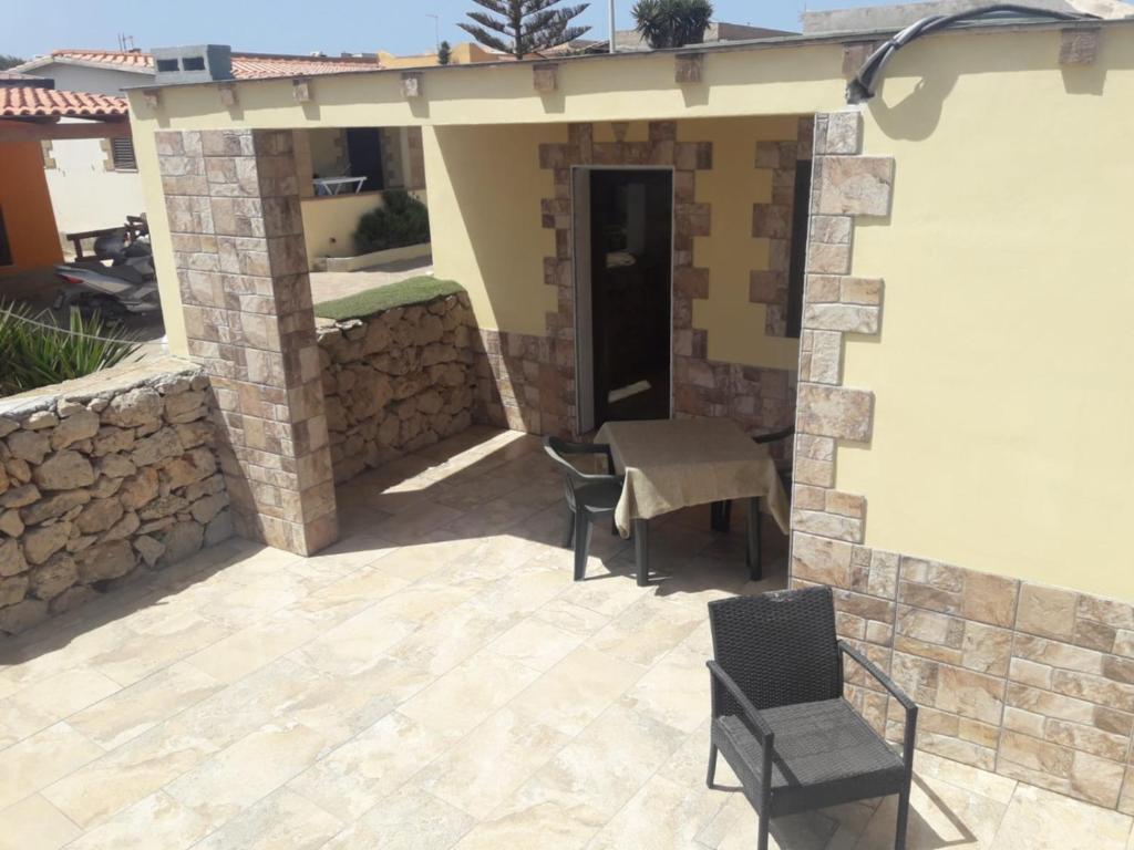 Patio lub wspólna przestrzeń na świeżym powietrzu w obiekcie Villa la Perla