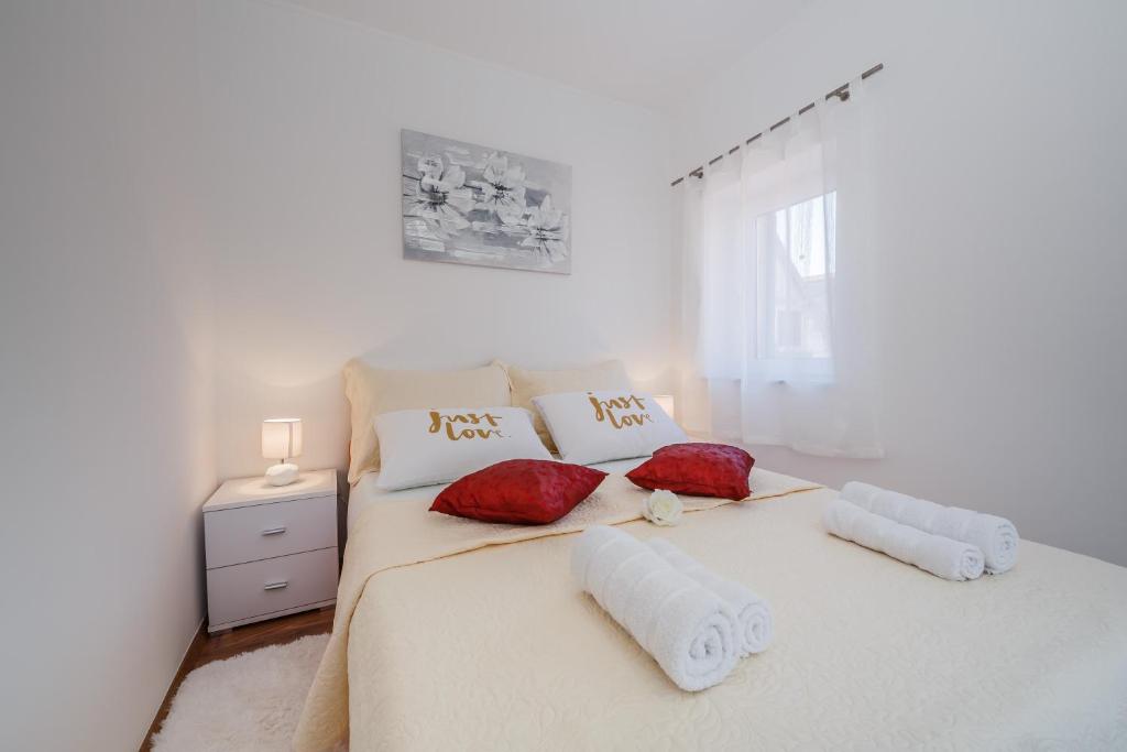 Posteľ alebo postele v izbe v ubytovaní Central Apartment Castle Cippico