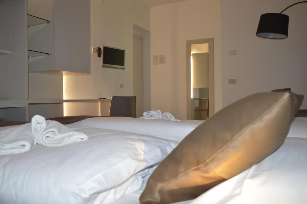 Postel nebo postele na pokoji v ubytování Hotel Garni Selene