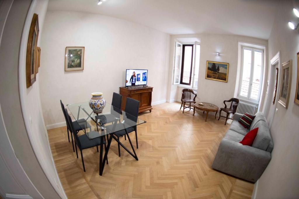 Televízia a/alebo spoločenská miestnosť v ubytovaní CasaLeone