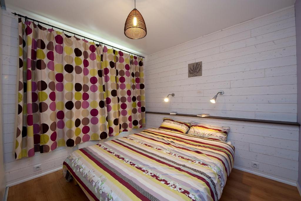 Llit o llits en una habitació de Résidence de Nodeven