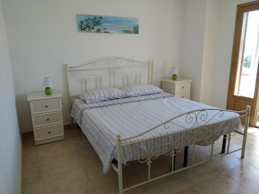 Postel nebo postele na pokoji v ubytování B Come Bianca