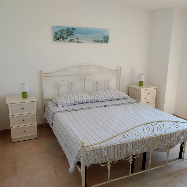 Postel nebo postele na pokoji v ubytování B Come Bianca