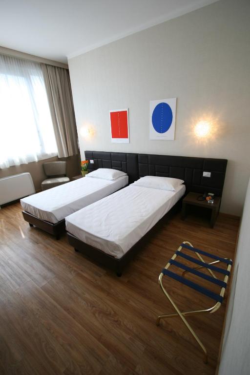 Postel nebo postele na pokoji v ubytování Hotel Oro Blu