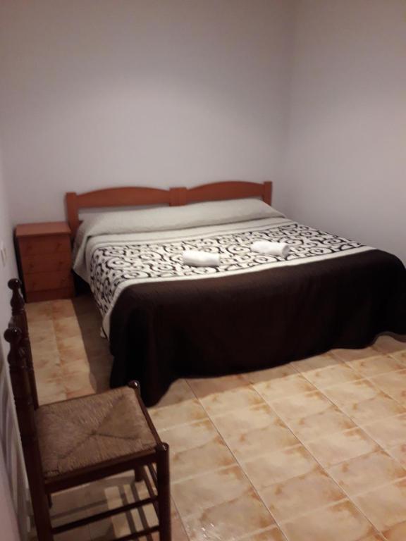 Posteľ alebo postele v izbe v ubytovaní Hostal Virgen Del Pilar
