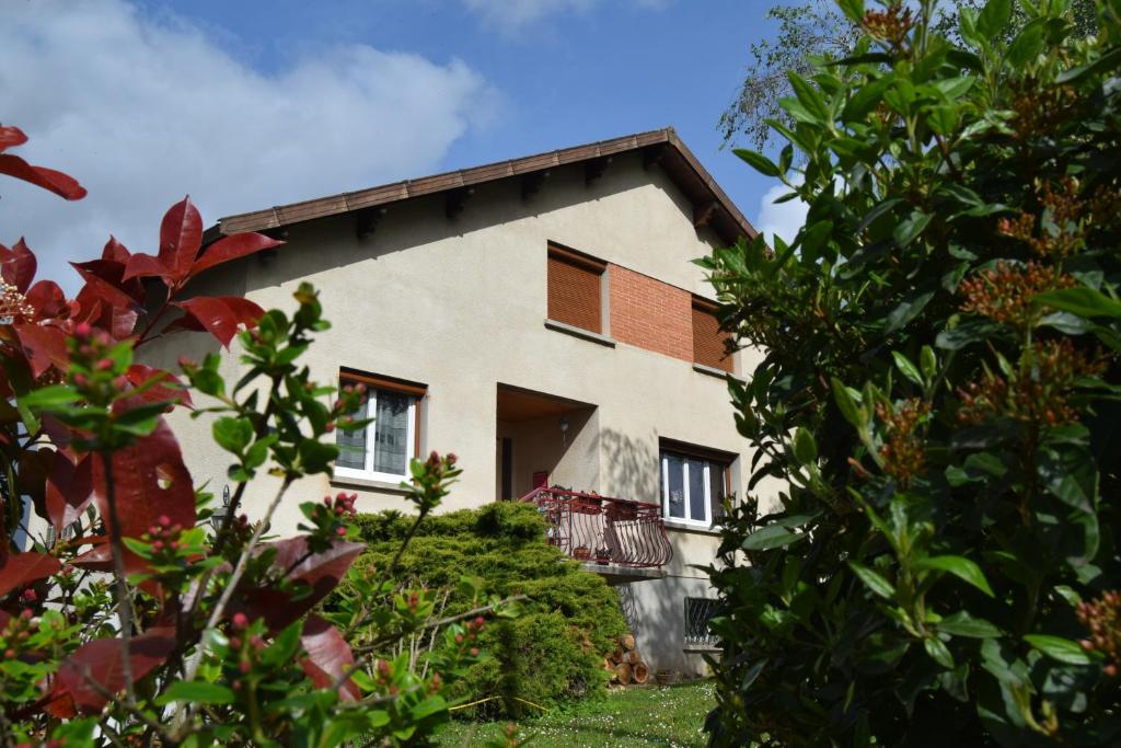 a house seen through the trees at Le Nid de l'Ecureuil in Brens