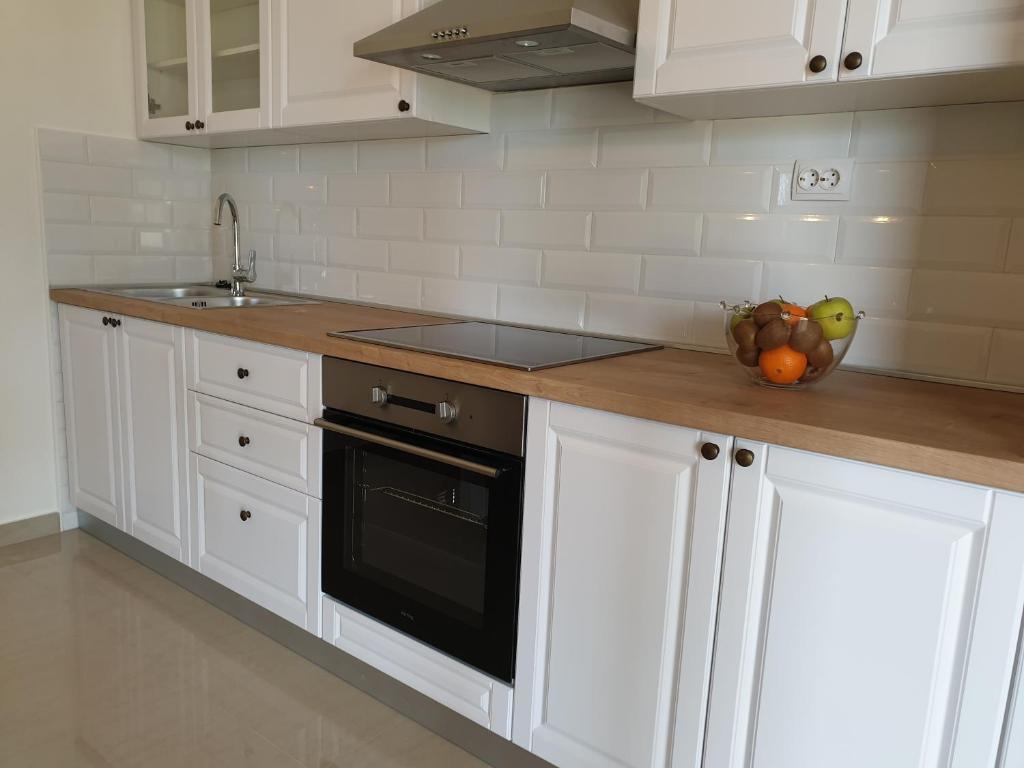 Kuchyň nebo kuchyňský kout v ubytování Apartment Kristina