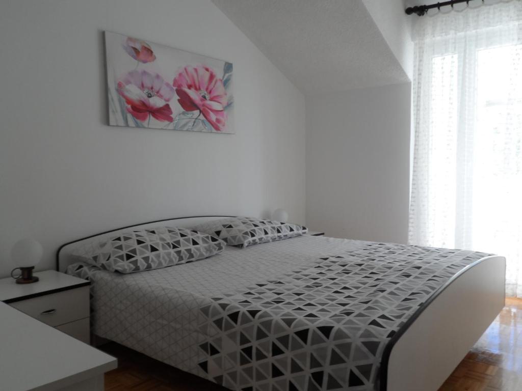 Posteľ alebo postele v izbe v ubytovaní Apartman Čupić