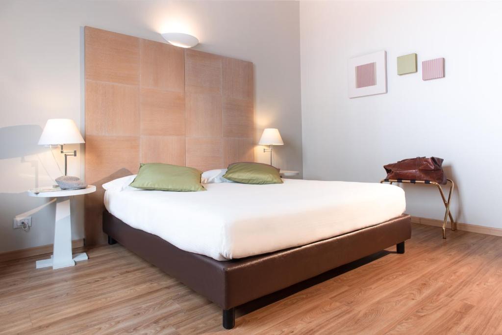 Postel nebo postele na pokoji v ubytování Hotel Oro Blu