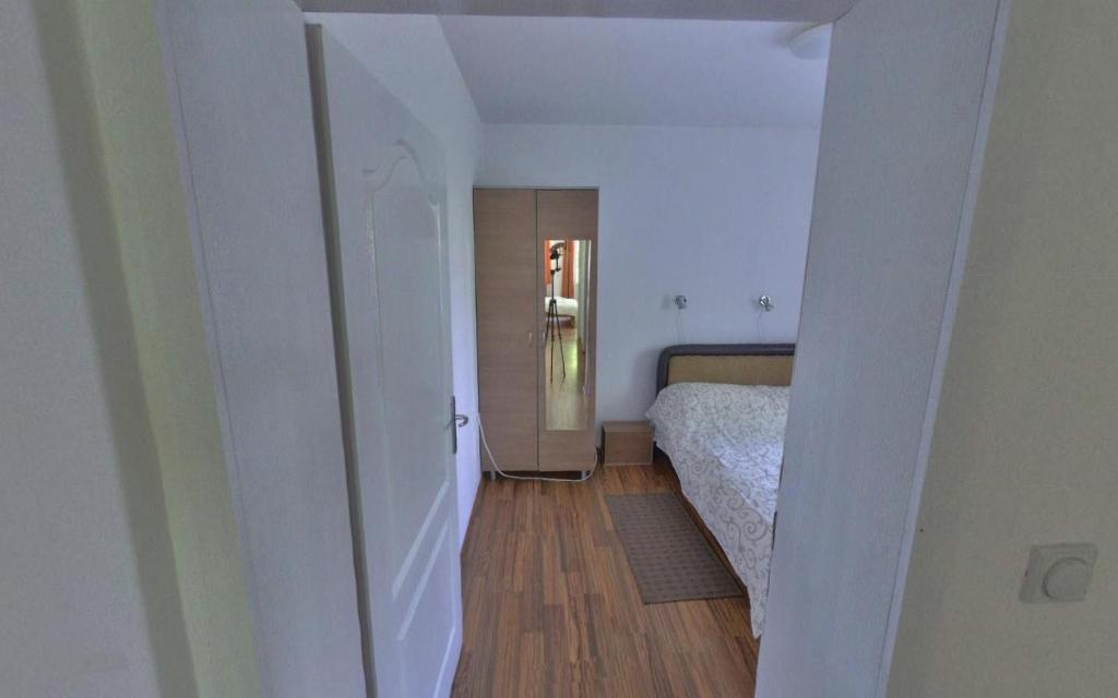 Postel nebo postele na pokoji v ubytování Apartments Banjica