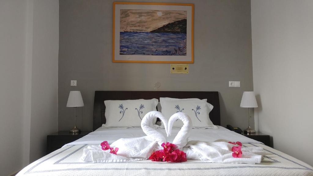 Postel nebo postele na pokoji v ubytování Hotel Galaxidi